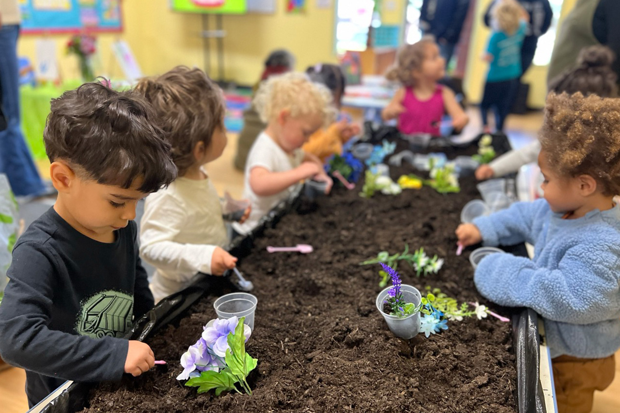 Toddlers playing and learning at Toddler Yorba Linda Montessori